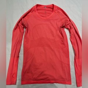 Lululemon orange long sleeves pullover.